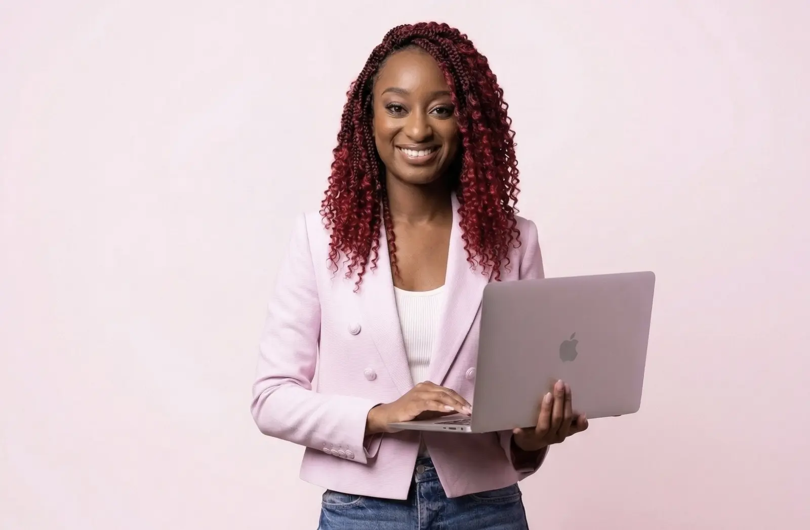 Shiloh holding a laptop