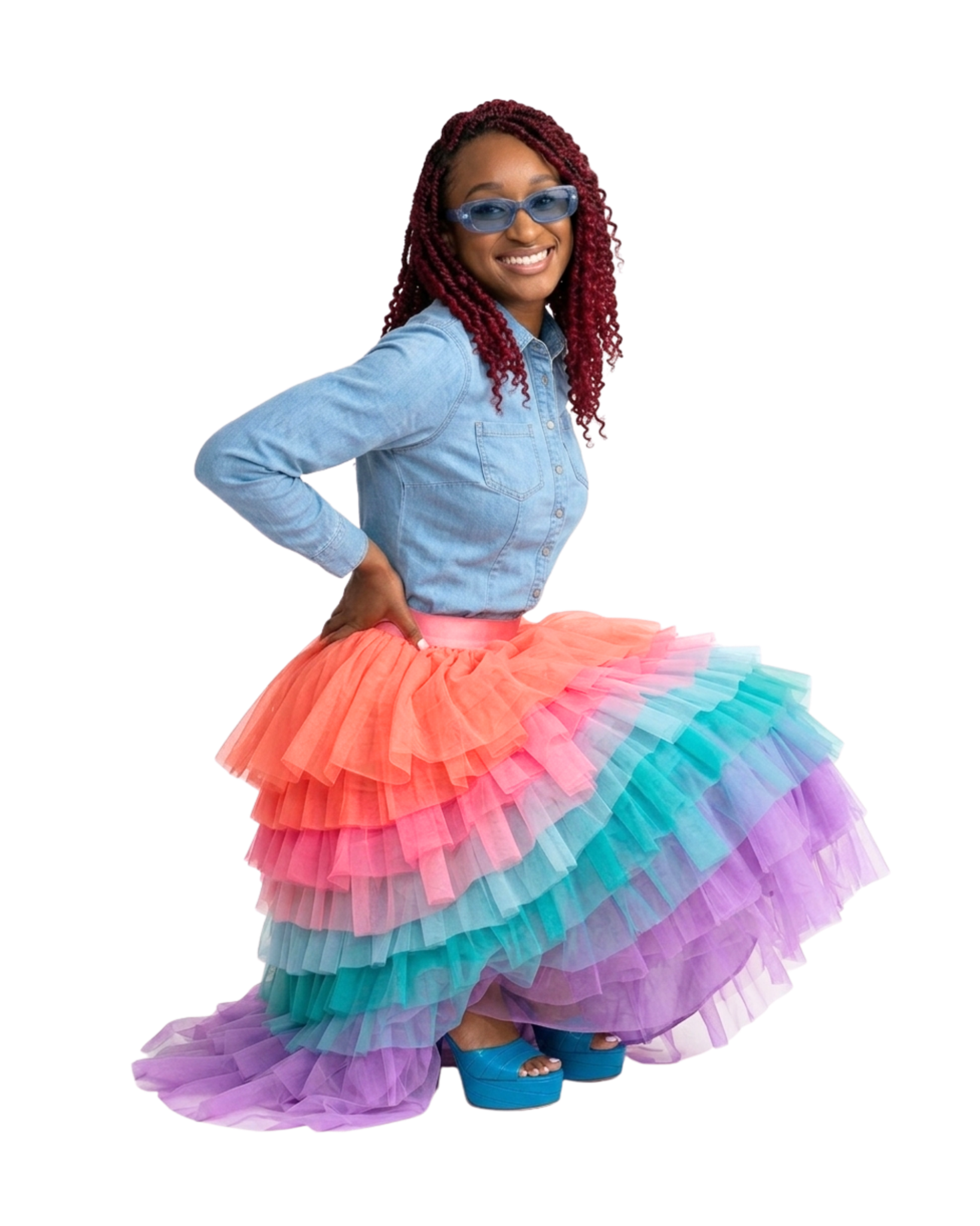 Shiloh in blue sunglasses and a colorful skirt